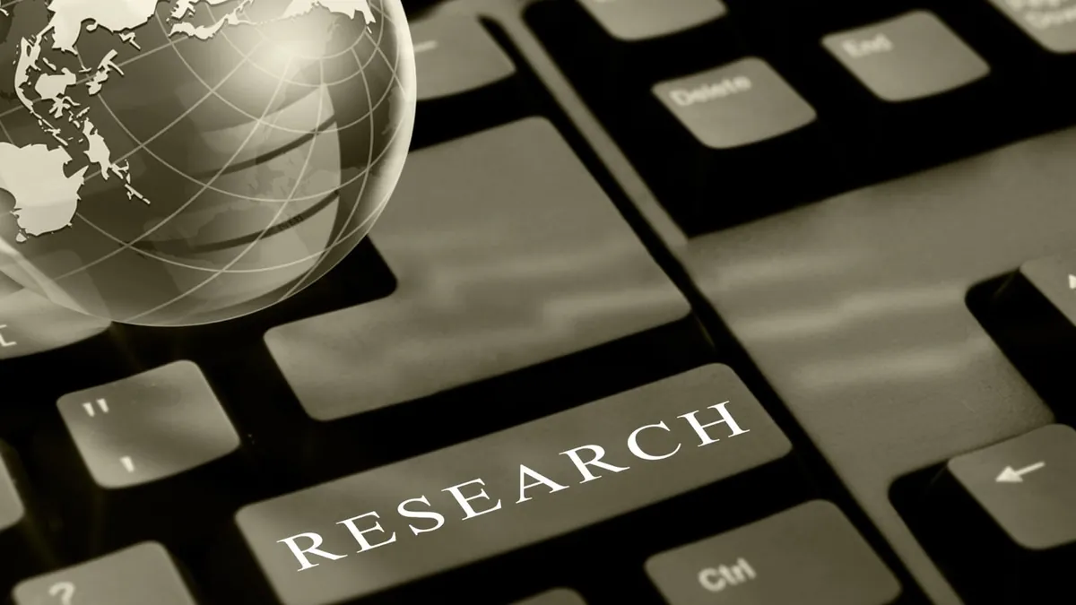 Close-up of a keyboard with a globe and a key

AI-generated content may be incorrect.